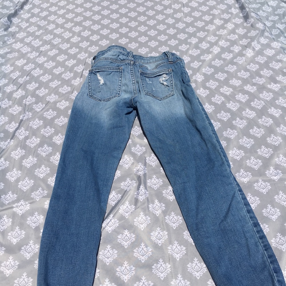 Light wash distressed jeans